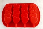 Wilton Silicone Stacked Hearts Mold Pan. Fixed Price $10.95.