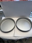 Cuisinart 9.5-INCH Round Cake Pan, Chef's Classic Nonstick Bakeware, Set Of Two. Fixed Price $24.00.