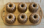 Nordic Ware Cast Aluminum Anniversary Bundtlette Copper Nonstick Cake Pan. Fixed Price $21.59.