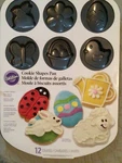 Wilton 12-CAVITY Shapes Pan Easter & Spring New. Fixed Price $13.99.