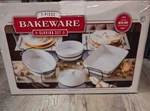 7-PIECE Ceramic Bakeware Serving Set With Metal Racks & Handles (newopened Box ). Fixed Price $45.00.