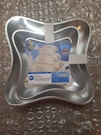 Wilton Tier Pillow Pan Set Included: 6 3/4", 10", & 13 1/4". Fixed Price $49.99.