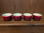 Le Creuset Of 4 Mini Red Stoneware Ramekins 3 Diameter 2 Height. Fixed Price $25.00.
