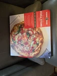 2 Piece Ceramic Pizza Stone With Steel Holder 13" X Absorbs Moisture. Fixed Price $19.00.