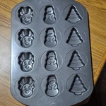 Wilton Non-stick 12-CAVITY Christmas Mini Cake Pan Snowman Tree Reindeer. Fixed Price $8.16.