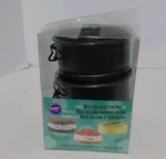 Wilton Mini Springform Pan 3 Piece Set 4" Diameter New Open Box 2105-2174. Fixed Price $10.95.