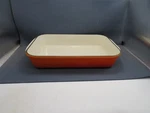 Creuest Cast Iron Emameled Cookware Flame Orange Rectangular Baker 15 5/8". Fixed Price $63.96.