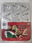 Wilton 2105-8463 Petite Christmas Trees Aluminum 12 Cavity Muffin Pan New Sealed. Fixed Price $14.00.