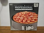 Chicago Metallic Professional Lifetime Non-stick 9" Spring Form Pan. Fixed Price $19.99.