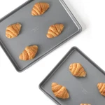 Calphalon Titan Steel Core Piece 12 X 17 Inch Nonstick Cookie Sheet Baking Pan. Fixed Price $49.18.