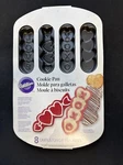 2012 Wilton Cookie Pan Mold Heart & Arrow Valentine's Holiday Baking New. Fixed Price $19.99.