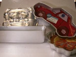 4 - Vintage Wilton Cake Pans Ark, Sporty Race Car, Wreath, Loaf. Fixed Price $21.00.