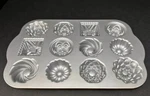 Nordic Ware Bundt Charms PAN1.2 1B. Fixed Price $30.00.