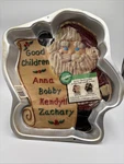 Vintage 1995 Wilton Santa Checking List Aluminum Cake Mold Pan 2105-3323. Fixed Price $7.99.