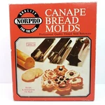 Vintage Norpro Canape Bread Molds Star Heart Flower Piece Set #3656. Fixed Price $13.88.