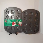 Wilton Christmas Cookie Baking Pans, Molds, Non Stick With 12 Cavity Each. Fixed Price $34.97.