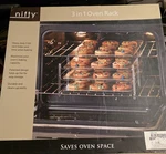 Nifty Heavy Duty Three-tier Oven Rack Folds Flat For Easy Storage- Never Used. Fixed Price $15.25.