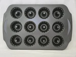 Wilton 12 Cavity Fluted Mini Bundt/tube Cake Pan. Fixed Price $14.95.