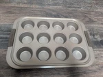 Anolon Advanced Bronze Nonstick Bakeware Muffin Pan -12 Cup. Fixed Price $21.25.