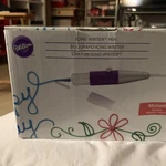Wilton, Icing Writer Pen Set, Easy W/ & Create Designs Treats. Fixed Price $51.00.
