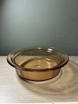Corning Ware Visions V-32-B Ribbed Glass Amber 1/2 Qt Round Casserole Dish. Fixed Price $14.00.