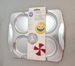 New Wilton 4 Round Cookie Treat Lollipop Pan 2105-0536. Fixed Price $15.00.