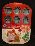 Wilton 12 Cookie Shapes Designs Pan Baking Christmas Holiday New. Fixed Price $17.95.