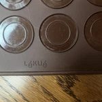 Lekue Macaron Baking Mat - Marrone. Fixed Price $25.00.