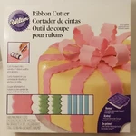 New Wilton Cake Decorating Fondant Ribbon Cutter With Storage Case 25 Pieces. Fixed Price $24.99.