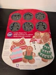 2014 Wilton Christmas Cookie Shapes 12 Designs Pan Baking Sheet New. Fixed Price $16.00.