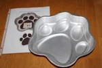 Wilton Paw Print Cake Pan #2105-0252 W/instructions 11"X2" 10.5" Aluminum. Fixed Price $7.99.