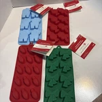 4 Silicone Celebrate It Christmas Baking/candy/ice Molds. Fixed Price $14.99.