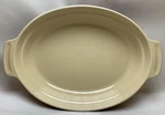 Le Creuset Large Oval Baking Dish Stoneware 06.30 Dark Mauve 12" X 9 3/4". Fixed Price $50.00.