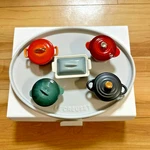 Creuset Miniature Cocotte History Collection 6PC 100TH Anniversary. Fixed Price $175.00.