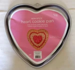 Wilton Heart Shaped Cookie Cake Pan 1998 12X12X3/4 Inches #2105-6203. Fixed Price $10.00.