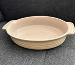 Le Creuset Stoneware Pink Oval Baking Dish 13" X 9". Fixed Price $54.00.