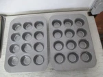 Set Of Usa Bakeware 12-CUP Muffin Pans #1200MF-1, Warp Resistant, Nonstick. Fixed Price $38.25.