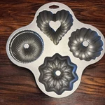 Nordic Ware Bundt Quartet Pan 9 Cup Mini Cake 4 Designs Gold Usa. Fixed Price $24.99.