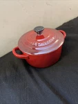 Creuset Cerise Ombre Black Handle Round Mini Cocotte Stoneware Dutch Oven. Fixed Price $25.00.