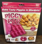 New Piggy Pop Silicone Baking Pan Bakes 12 Pigs As Seen Tv Bpa Free. Fixed Price $9.00.