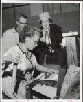 1966 Press Photo Mrs. Harold West Weaves Mats As Mr. & O. Depperman Look On. Fixed Price $24.99.