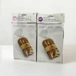 Two Wilton Loaf Gift Kit With 4 Bags Each, Ties And Labels. Fixed Price $7.64.