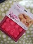 Brand New Mobi Oven Safe Silicone Baking Mold, 12 Little Pink Pigs Blanket. Fixed Price $10.00.