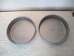 2 Usa Pan Bakeware 8" Round Cake #1060LC-1, Warp Resistant, Nonstick. Fixed Price $29.75.
