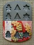 New Wilton Holiday Cookie Shapes Non Stick Baking Pan 12 Cavities 3 Designs. Fixed Price $11.99.